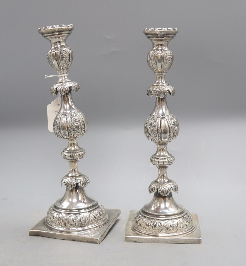 A pair of 19th century Russian 84 zolotnik Sabbath Day candlesticks, retailed by J. Goldman,